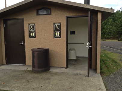 Accessible restroom with vault toilets – if locked porta potty may be behind restroom